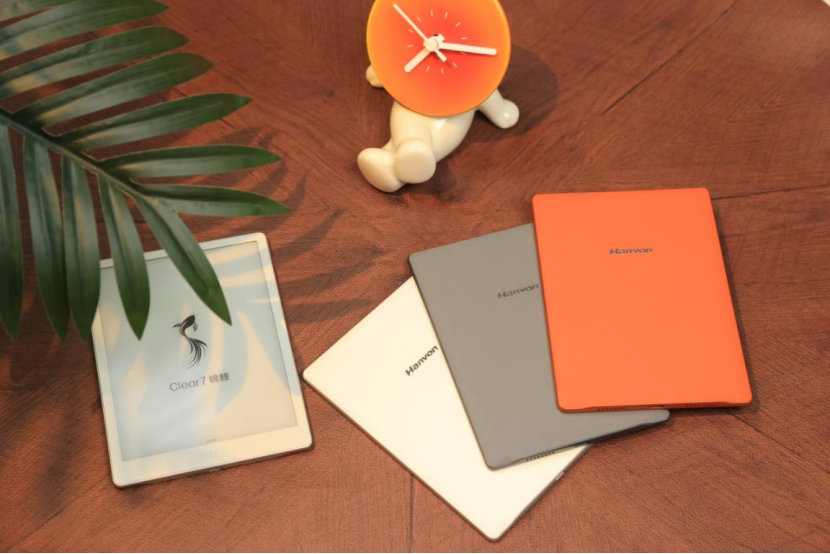 汉王 Clear 7 锦鲤 7 寸旗舰电子阅读器外观展示，橙色配色搭配轻薄机身，搭载 Oxide 增压瞬浮屏与 T2000 快刷引擎